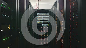 Multiple rows of meticulously organized servers housed in a high-density data center, Computer server in a minimal environment