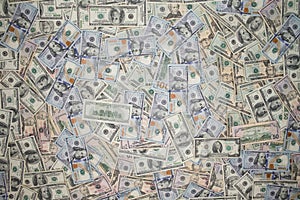 Multiple scattered American 100 dollar banknotes