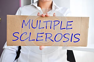 Multiple sclerosis concept with doctor holding a cardboard