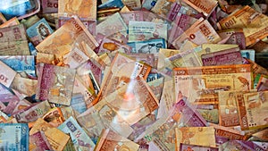 Multiple Srilankan notes in a glass box