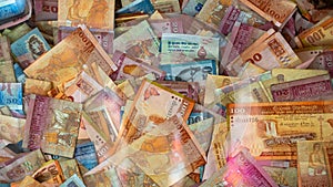 Multiple Srilankan notes in a glass box