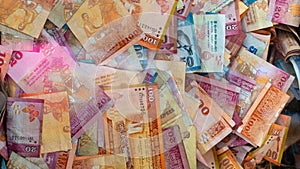 Multiple Srilankan notes in a glass box