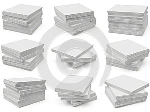Multiple stacks of pristine white paper sheets