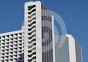 Multiple-story building soars into blue sky