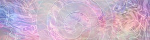 Multiple streams of beautiful random swirling pastel pink, blue and yellow energy background banner