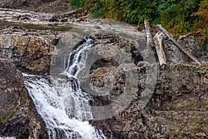 multiple teirs of water cascade down from upper pools