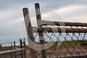 Multiple temporary fence panels leaning against each other on a