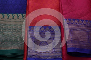 Multiple varieties of handwoven silk sarees in vibrant colors