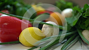 Multiple vegetables and fruits sitting on table