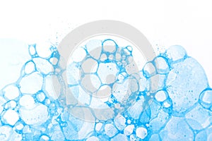 Multiple white blue soap bubbles abstract background texture, artsy backdrop, copy space, full frame, nobody. Simple clean cold