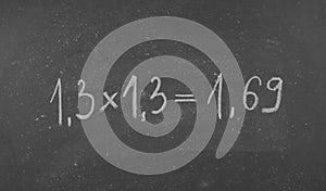 Multiplication of numbers with a decimal notation.