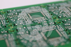 Multiplied printed circuit boards PCB isolated on the white background. PCB assembly. Close-up view