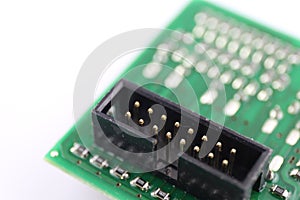 Multiplied printed circuit boards PCB isolated on the white background. PCB assembly. Close-up view. Connector detail