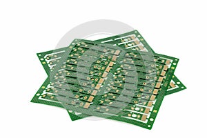 Multiplied printed circuit boards PCB  on the white background.