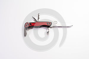 Multipurpose open Swiss army knife isolated on white background