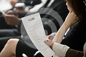 Multiracial business people waiting in queue preparing for job i