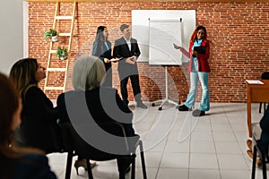 Multiracial business people working inside conference room