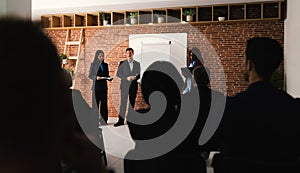 Multiracial business people working inside conference room