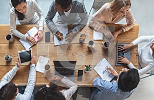 Multiracial business team having meeting, top view