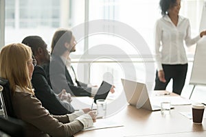 Multiracial businesspeople attending corporate group training or photo