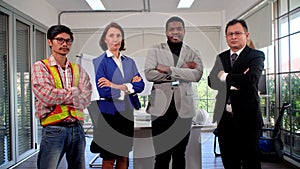 Multiracial businesspeople standing together at workplace. Group of confident positive friendly colleague expertise staff support