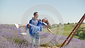 Multiracial couple having fun in lavender field