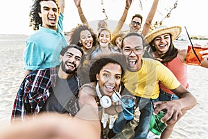 Multiracial friends group taking selfie picture on summer vacation