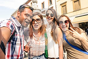 Multiracial friends taking selfie at city tour - Happy friendship concept with gen z student having fun together - Millenial