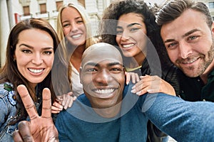 Multiracial group of young people taking selfie