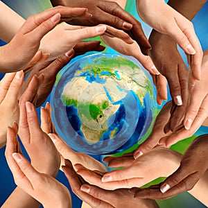 Multiracial Hands Around the Earth Globe photo