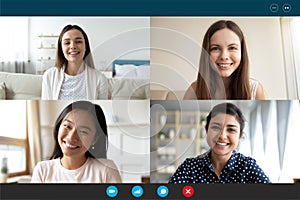 Multiracial happy girlfriends have fun talking on video call