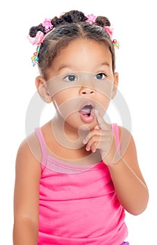 Multiracial small girl with a funny inquisitive expression photo
