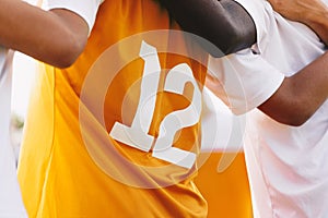 Multiracial Sports Team Members United. Closeup Image of Soccer Shirt Back Side