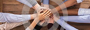 Multiracial Staff Hands Stacking