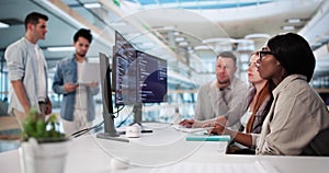 Multiracial Team Of Programmers Developing Software Code