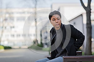 multiracial woman with apathy looking away