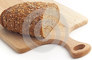 Multiseed bread on wooden board