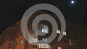 Multistorey apartment residential house at night