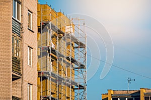 Multistory house  facade thermal insulation with rock wool