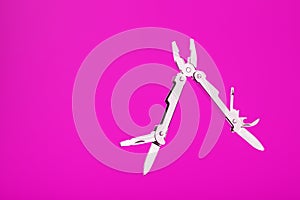 Multitool is a multi-functional tool on a pink background. The concept of an open, flying multi-tool with free space