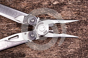 Multitool, multi purpose tool with plyers and