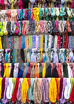 Multitude of colourful scarves