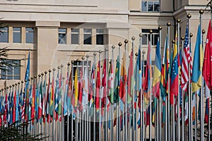 Multitude of flagpoles at the United Nations palace in Geneva. Close up shot, no people