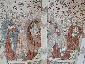 A multitude of women in medieval clothing, an ancient mural-painting