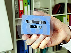 Multivariate Testing sign on the blue business card