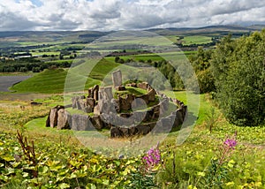 The multiverse stone circle with the Andromeda and Milky Way hills behind in the Crawick Multiverse