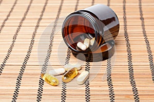 Multivitamin Pills in a brown medicine jar