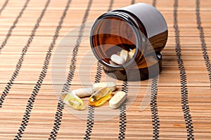 Multivitamin Pills in a brown medicine jar