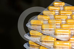 Multivitamins in capsules in close-up