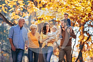 Multl generation family in autumn park